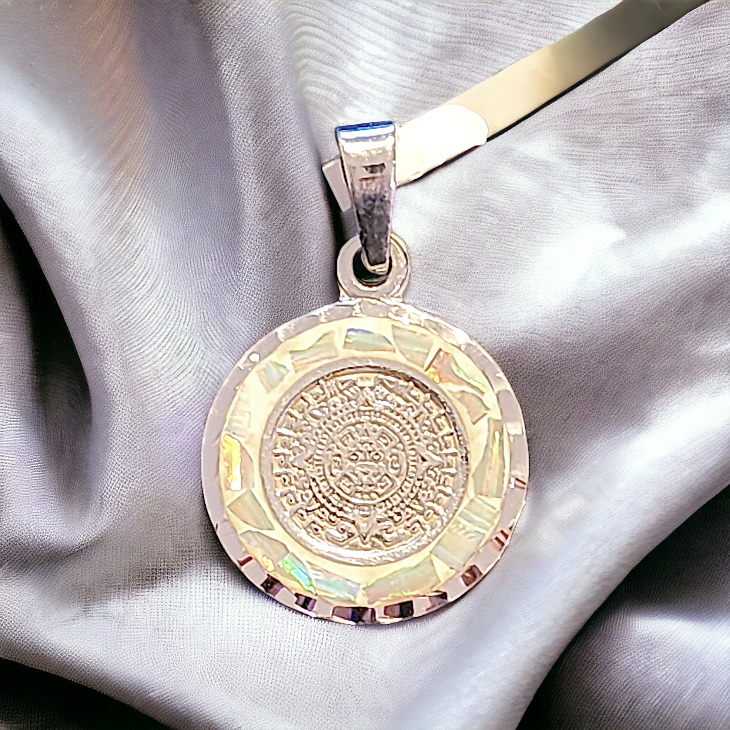 Aztec calendar with white opal inlay