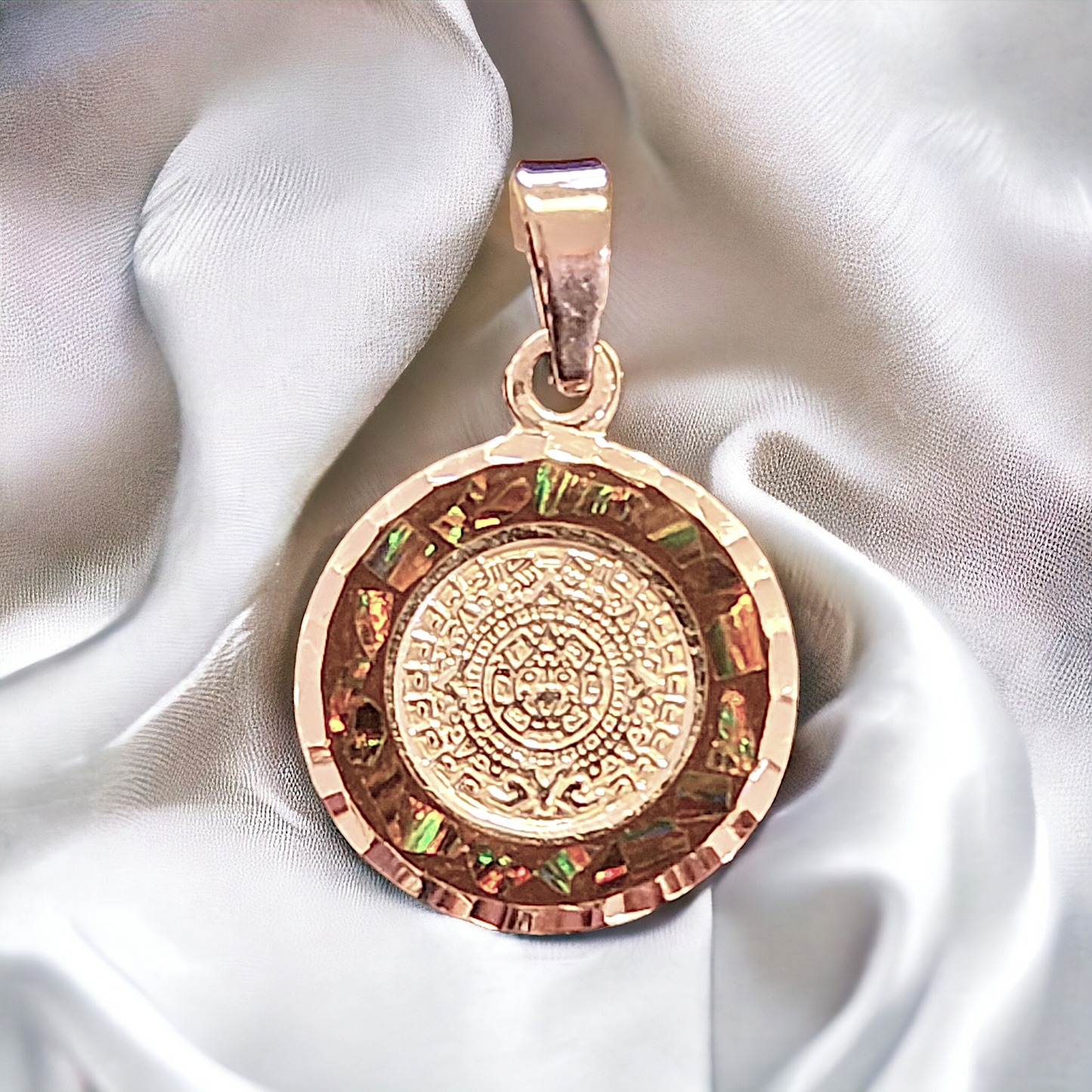 Aztec calendar with fire opal inlay
