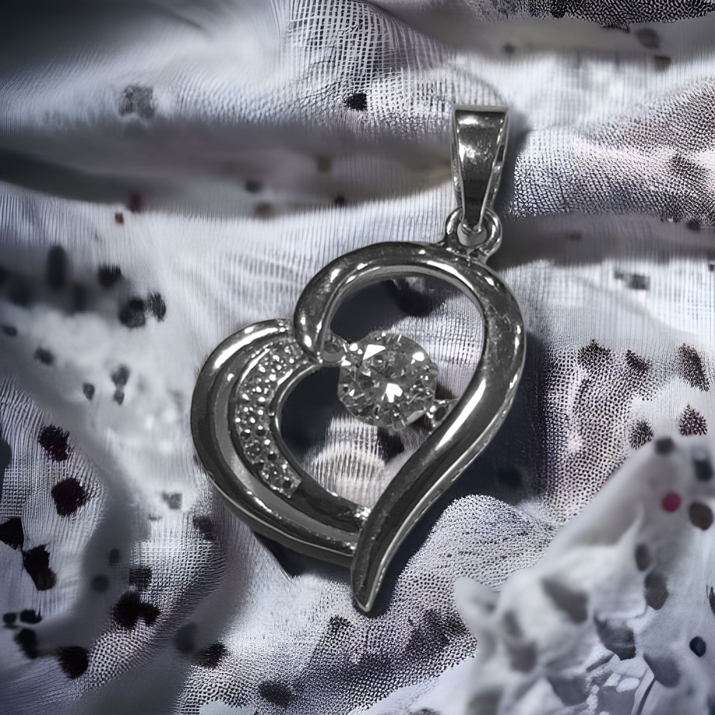 Dancing Sapphire Heart Pendant