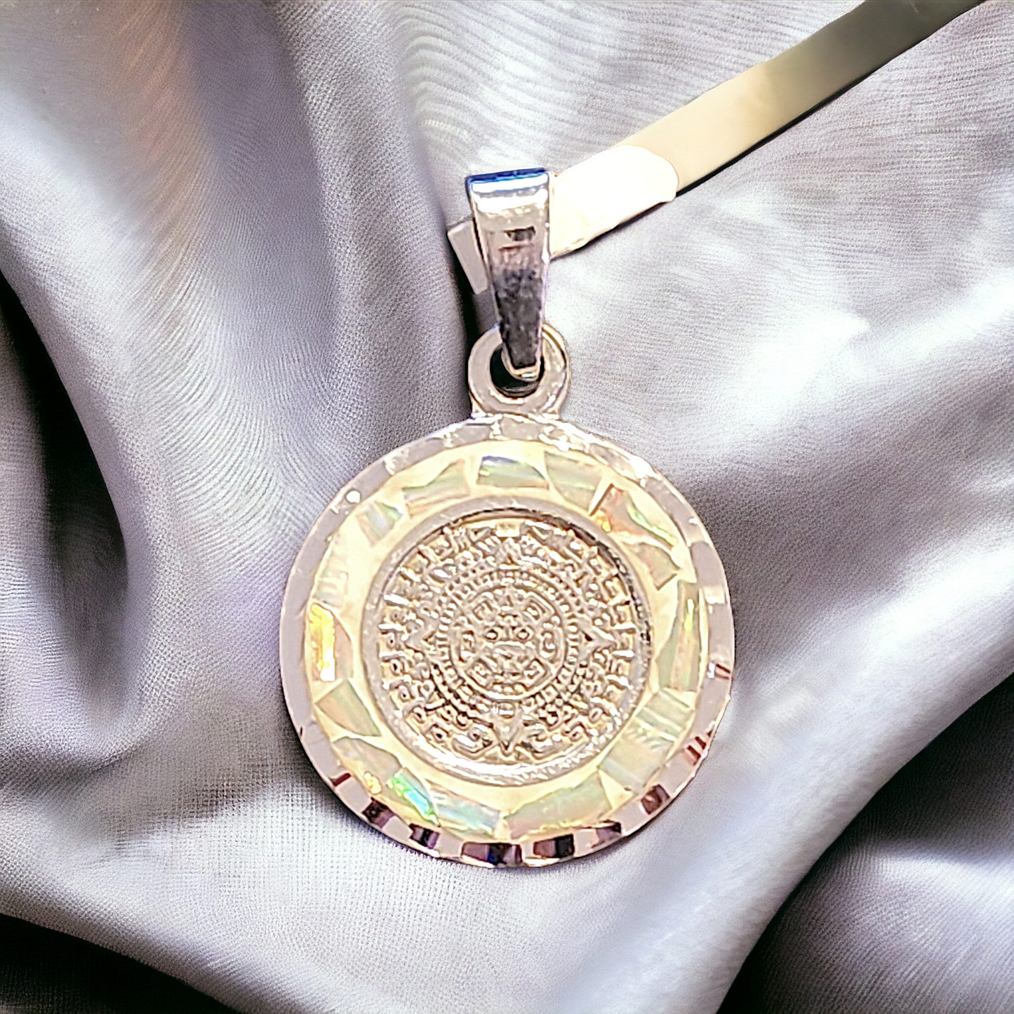 Aztec calendar with white opal inlay 