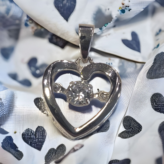 Dancing Sapphire Heart Pendant